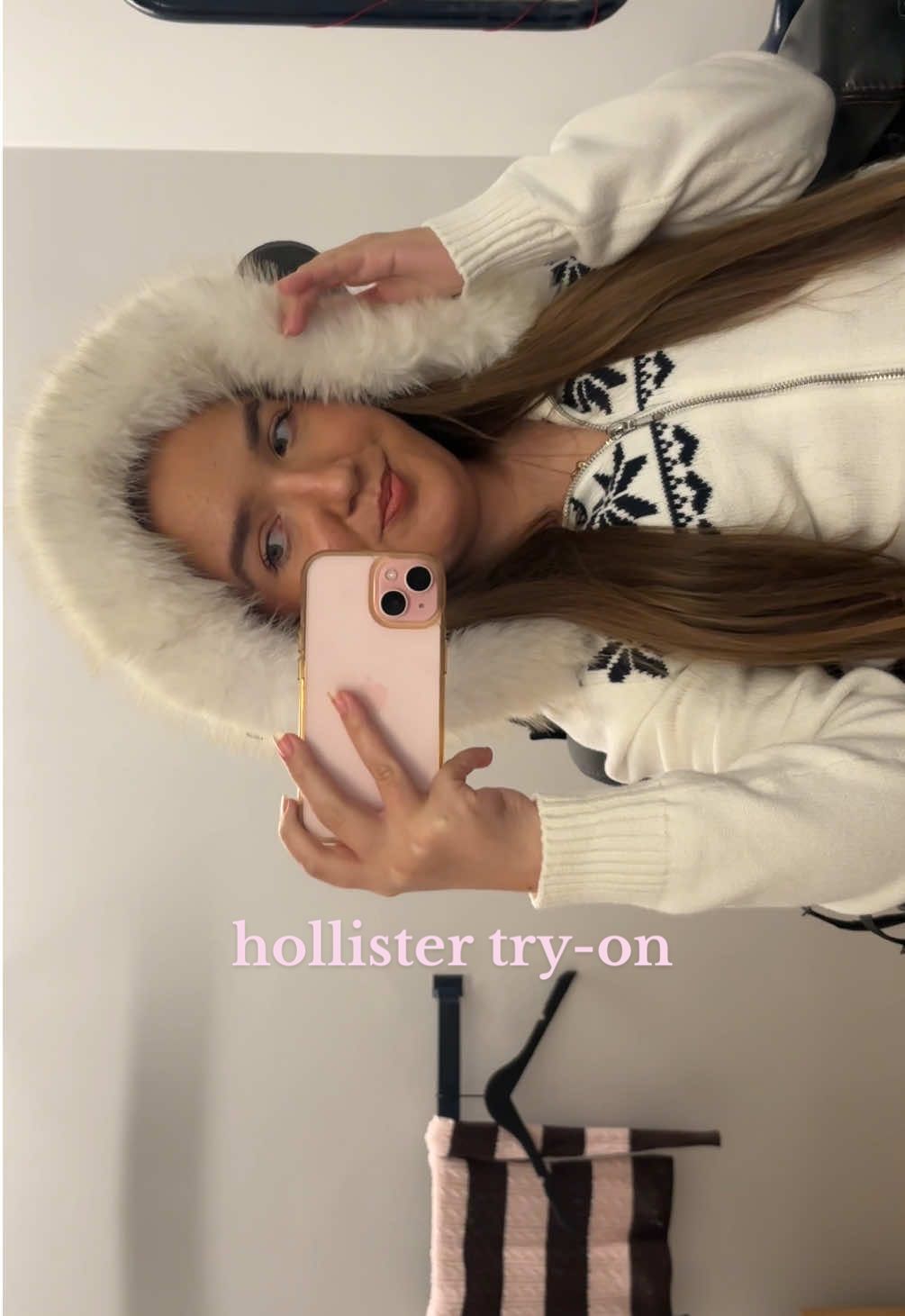 TikTok post by @mayasquashingtoes for hollister. Caption reads: come shopping with me in @hollister ✨ i tried on....