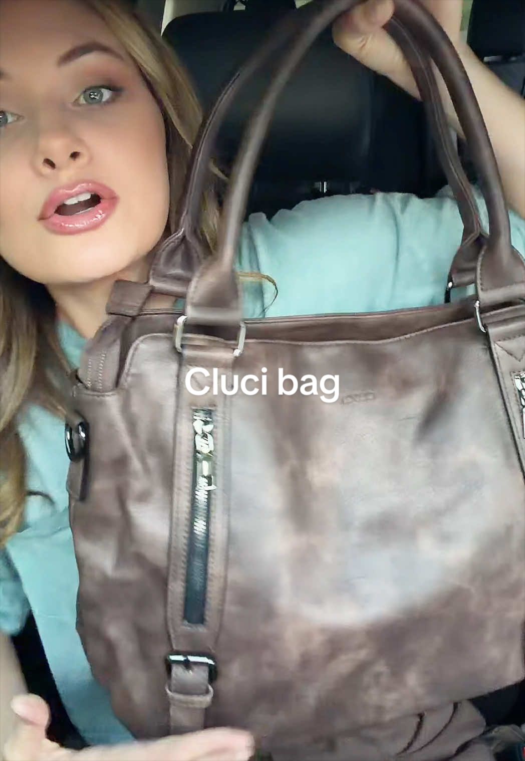 TikTok post by @something_about_sarah for CLUCI. Caption reads: [...] out here looking like a rich girl 😍😍😍....