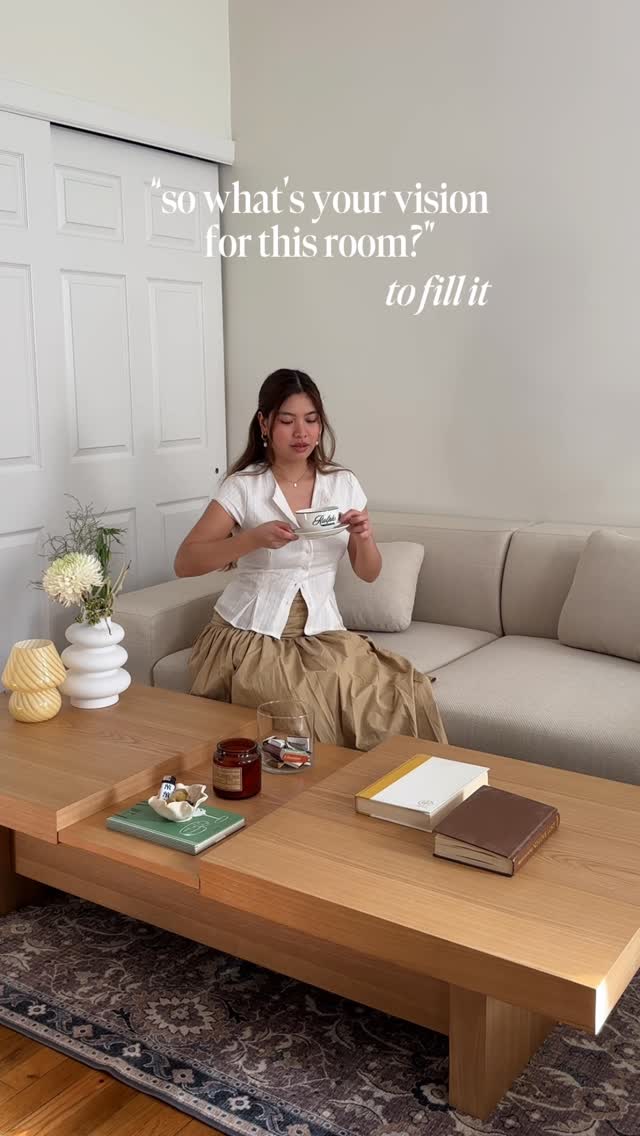 Instagram post by @biancagan for Cozey. Caption reads: my @cozey coffee table completing my space ☕️🪴....