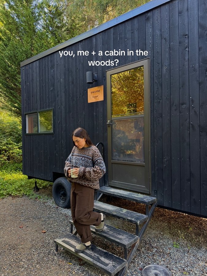 Instagram post by @sydneysky_ for Postcard Cabins. Caption reads: Camping in the cozy seasons with Postcard Cabins....