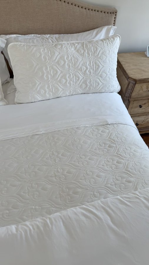 Instagram post by @the.cozy.colonial for Linens & Hutch. Caption reads: Spending as much time in bed as you do, it’s....