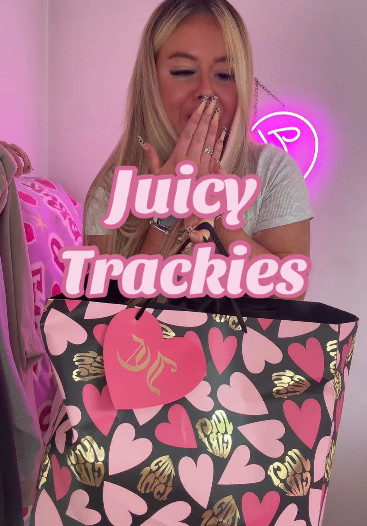 TikTok post by @charlyannec for Juicy Couture. Caption reads: AD - JUICY COUTURE HEVVVV!!! I got my own [...].