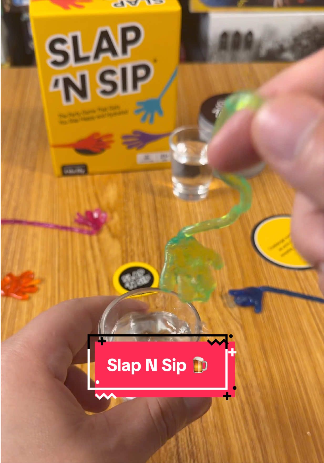 TikTok post by @tiktokboardgames for Thrilly Games. Caption reads: [...] to drink. This game was created by @Thrilly....