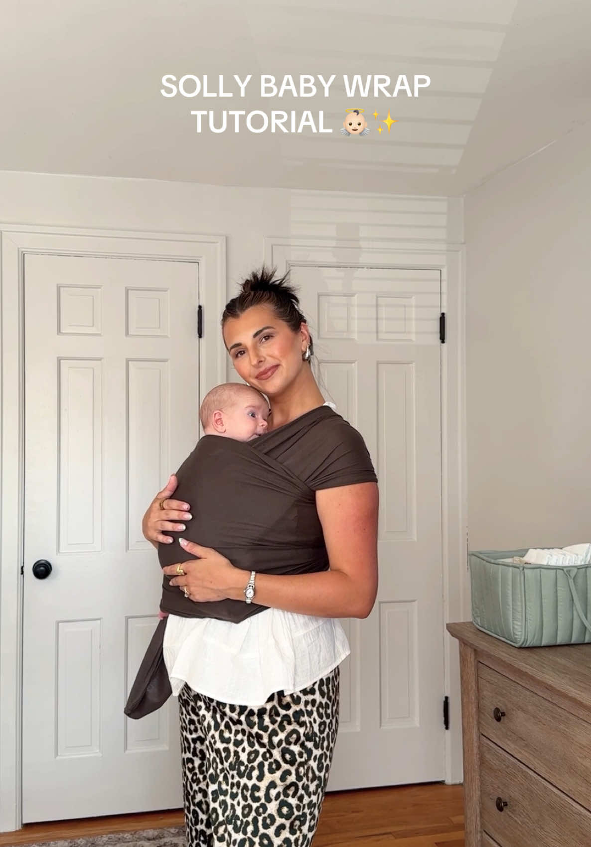 TikTok post by @tiffaniwithaneye_ for Solly Baby. Caption reads: I loveeee my @Solly Baby wraps & they just....