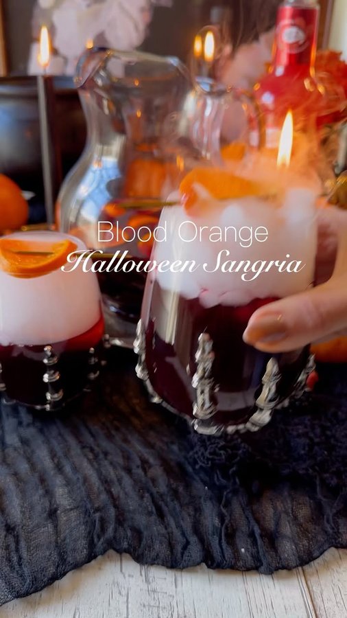Instagram post by @freutcake for Master of Mixes. Caption reads: #ad This classic Halloween Sangria made with....