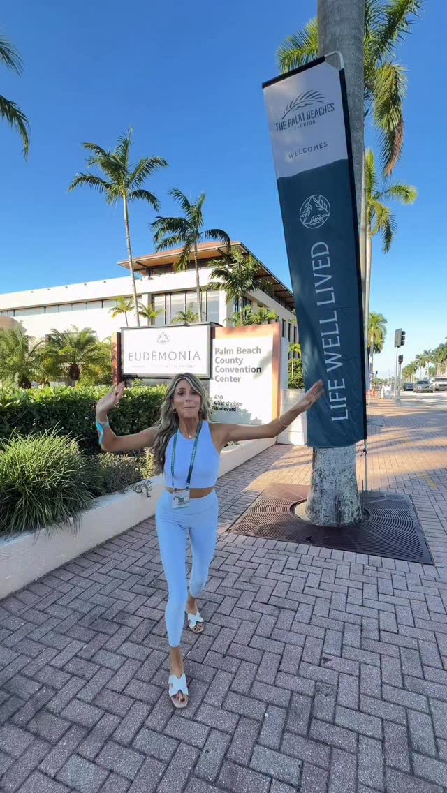 Instagram post by @floridayogamama for The Palm Beaches. Caption reads: A day in @palmbeachesfl at @eudemoniasummit…a life....