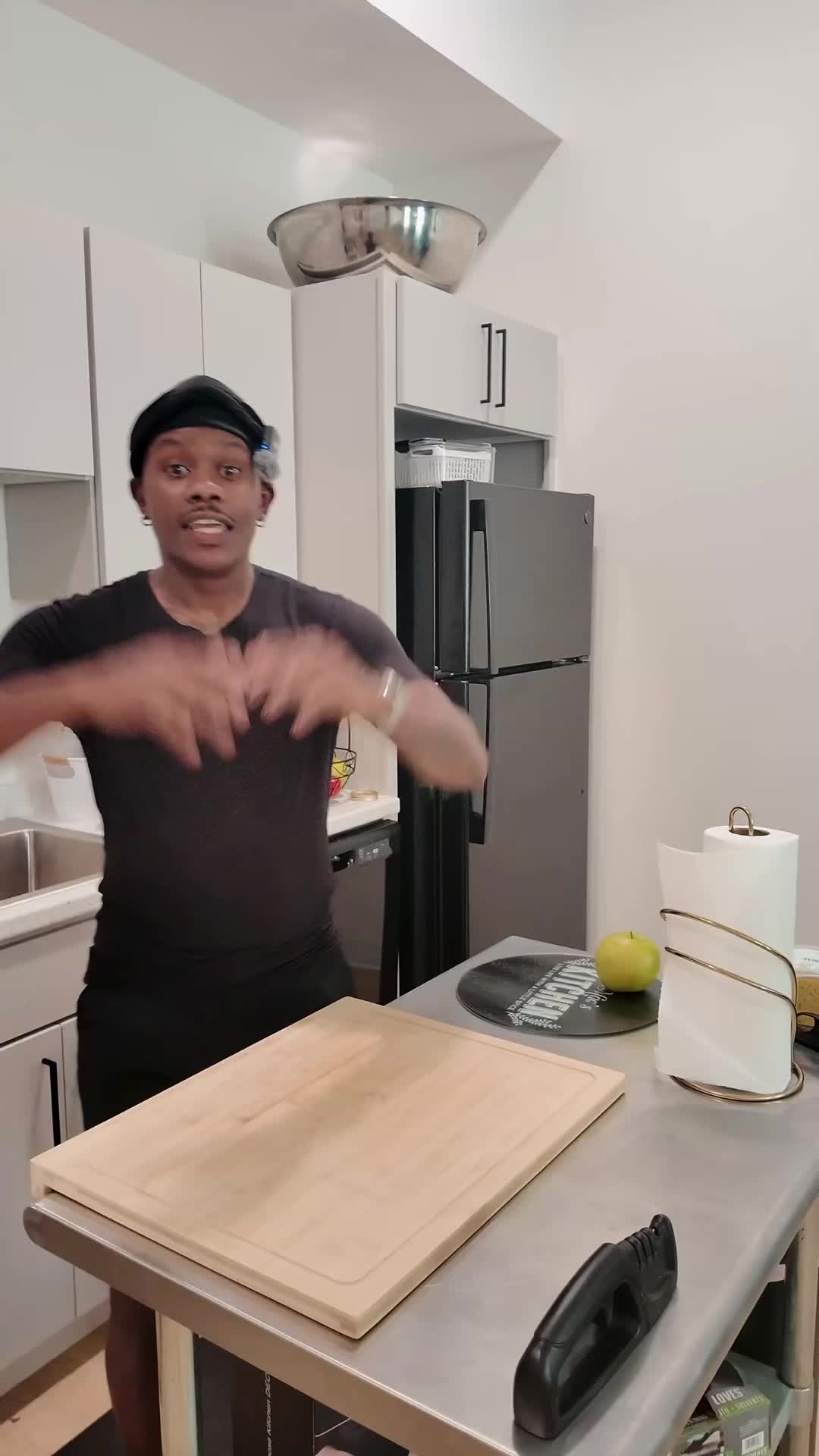 TikTok post by @iammacroyals for Astercook. Caption reads: New knifes make me feel alive!!! @Astercook USA....