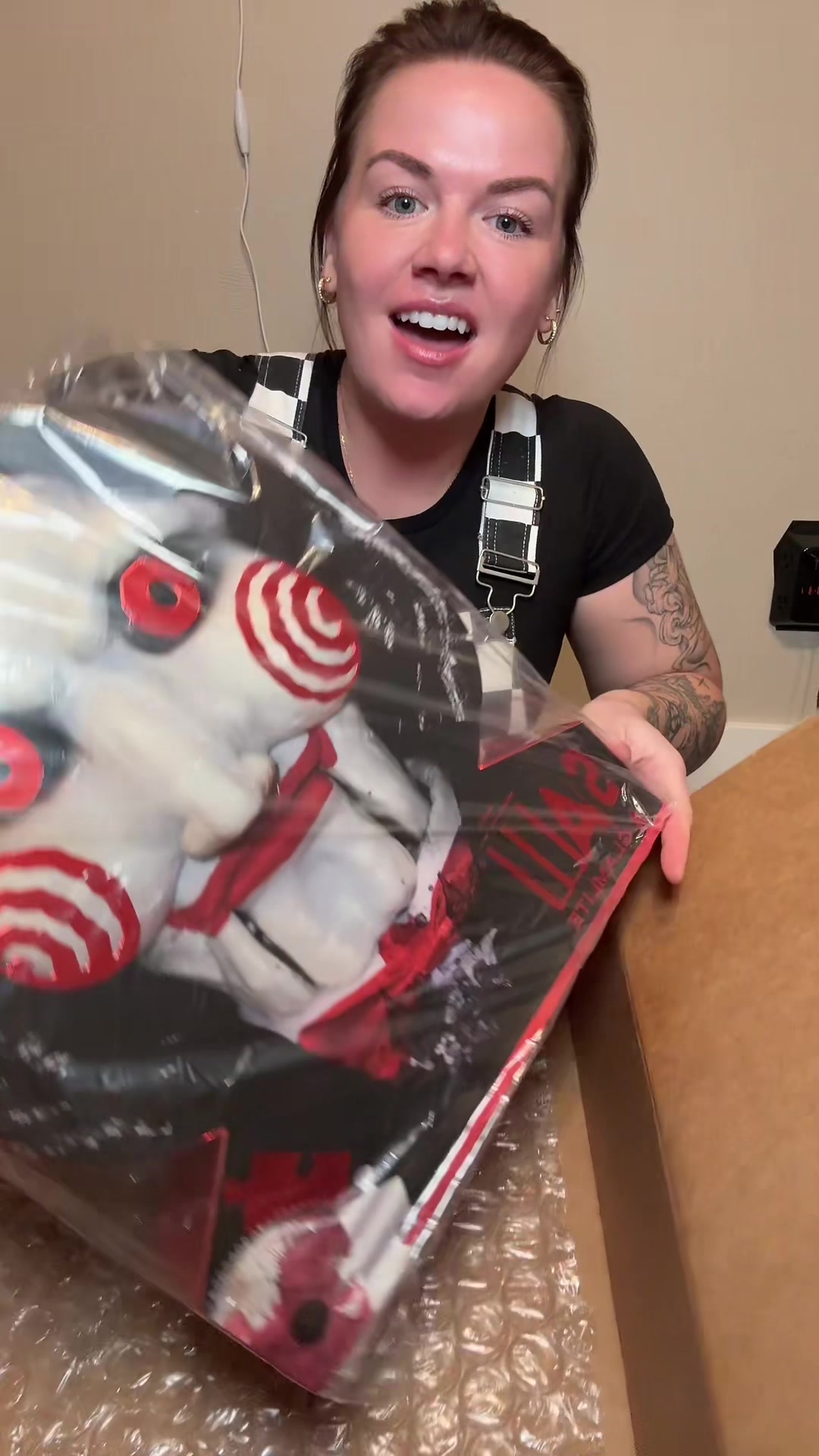 TikTok post by @brittdawn for Glamlite. Caption reads: Saw x Glamlite! 🧩🪚This SAW makeup collection is....