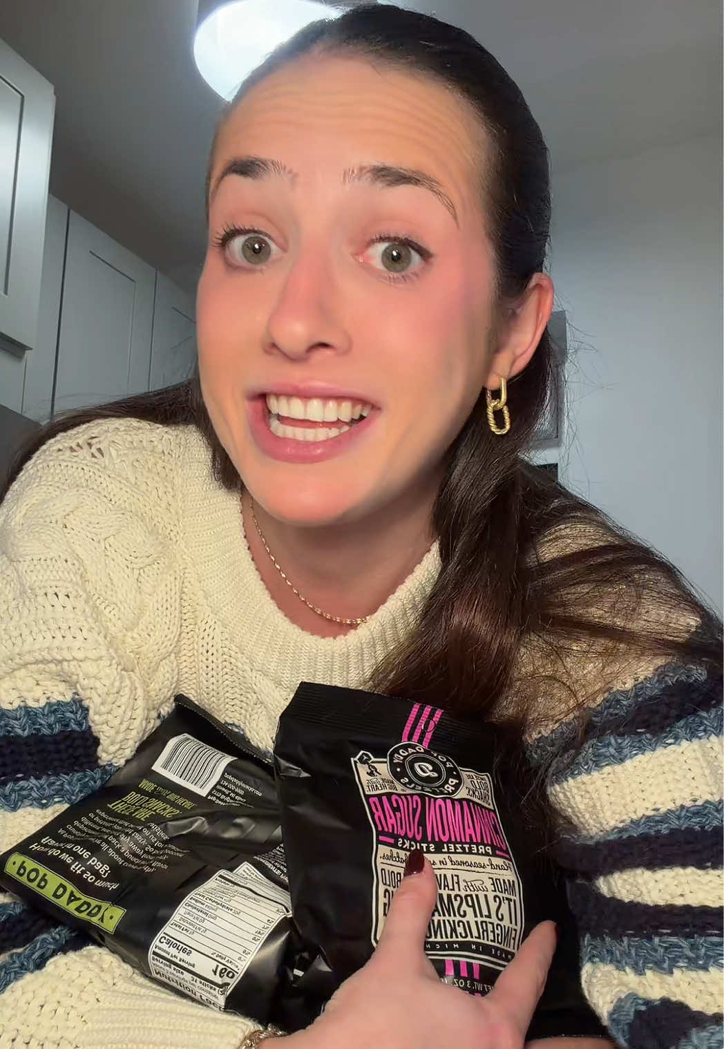 TikTok post by @ashleyhabess for Popdaddy Snacks. Caption reads: [...] #pretzels #tiktokshopblackfriday....