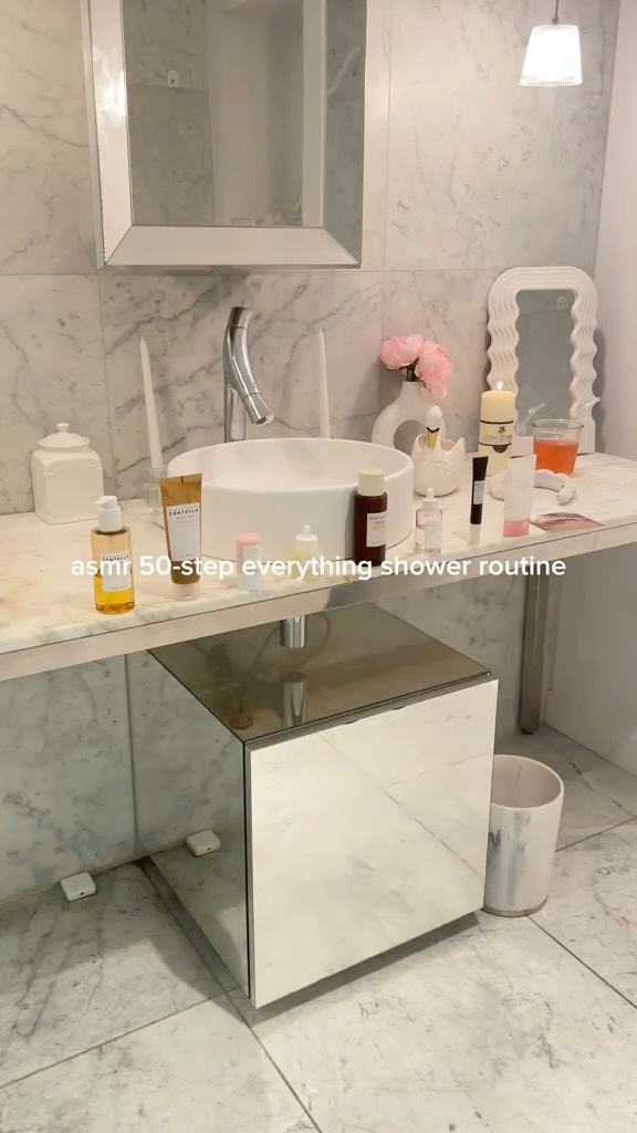 Instagram post by @galiciagordon for Cocoandeve. Caption reads: asmr 50-step everything shower routine....