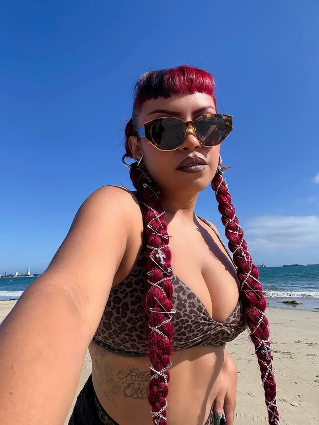 Instagram post by @andreadreaam for YITTY. Caption reads: Beach day 🐆☀️ Bathing suit from @yitty....