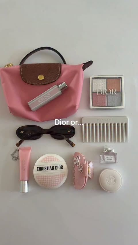 Instagram post by @carrieanne_ for LONGCHAMP. Caption reads: Team Dior or Chanel? 💗🖤 pr inc - #diorbeauty....