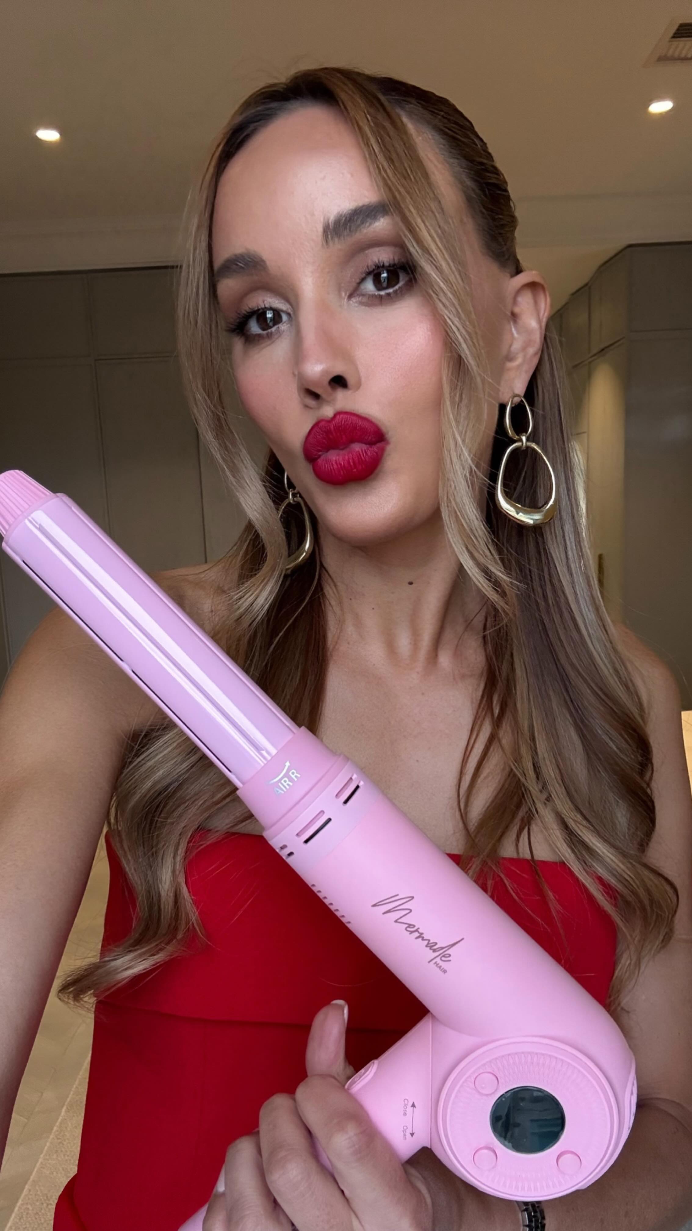 Instagram post by @becjudd for Mermade Hair. Caption reads: @mermade.hair delivering the hair goods as we....