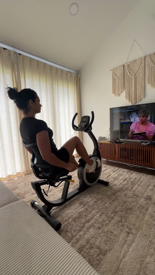 Instagram post by @deboraoehler for Merach. Caption reads: Who says you can’t game and get a workout in? The....