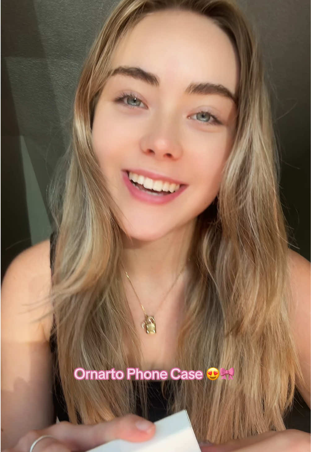 TikTok post by @mila.nabours for ORNARTO. Caption reads: [...] new fave phone case for the summer 😍🎀....