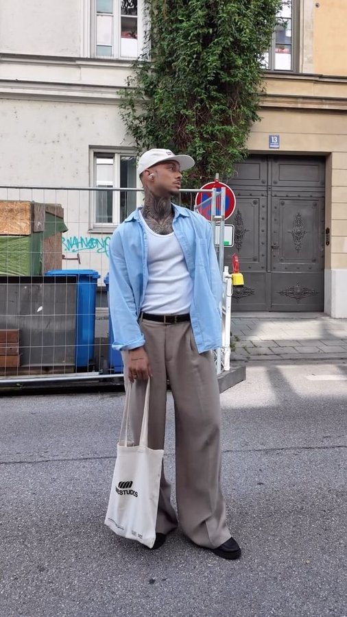 Instagram post by @natelucantoni for EME STUDIOS. Caption reads: Fit check in the streets....