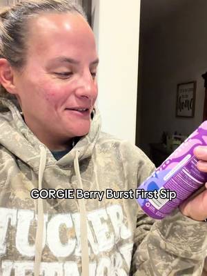 TikTok post by @lindseycora for Gorgie. Caption reads: @GETGORGIE first Berry Burst Sip! 💜.