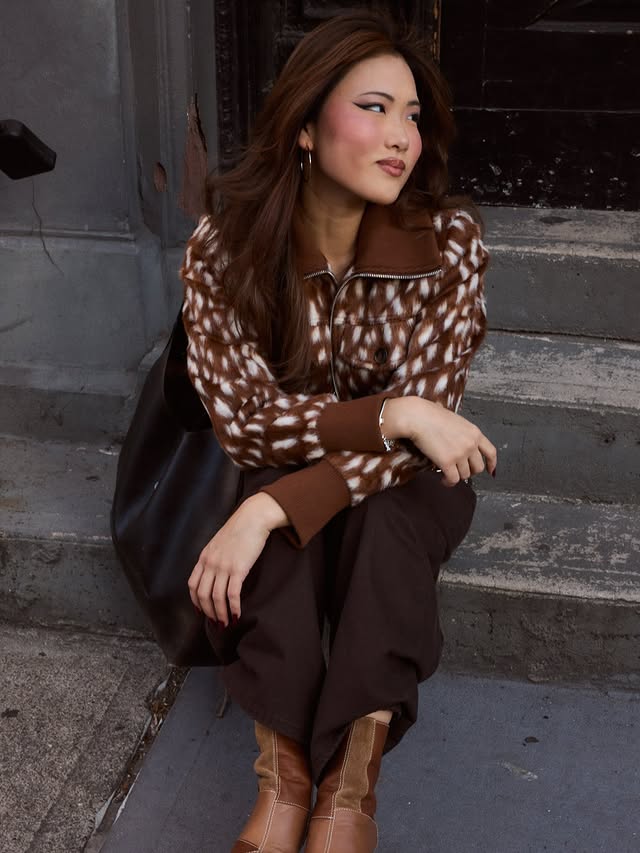 Instagram post by @yunabatmunkh for Steve Madden. Caption reads: [...] autumn in new york🍂🍎🧸🚕 @stevemadden....