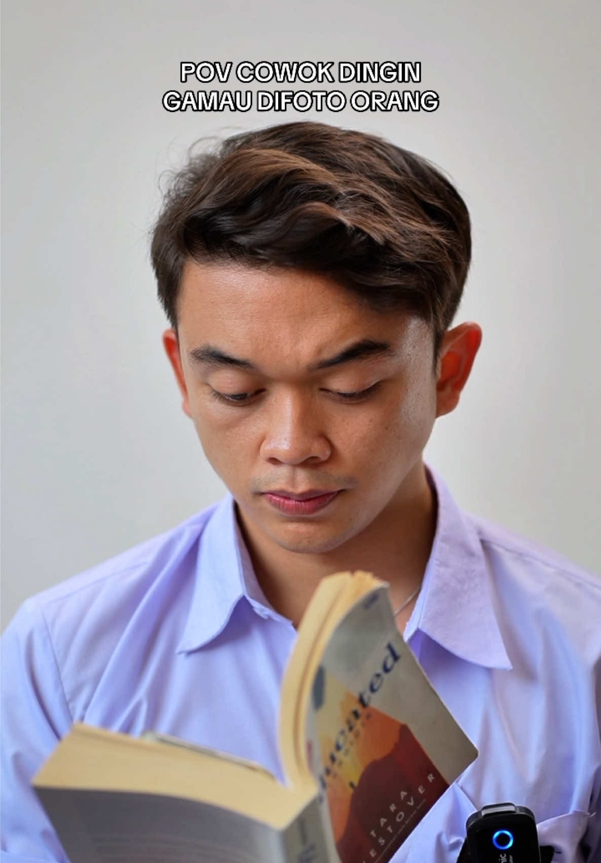 TikTok post by @luqmanrv for Garnier Indonesia. Caption reads: Gausah modus foto deh, muka gue lagi gak bagus......