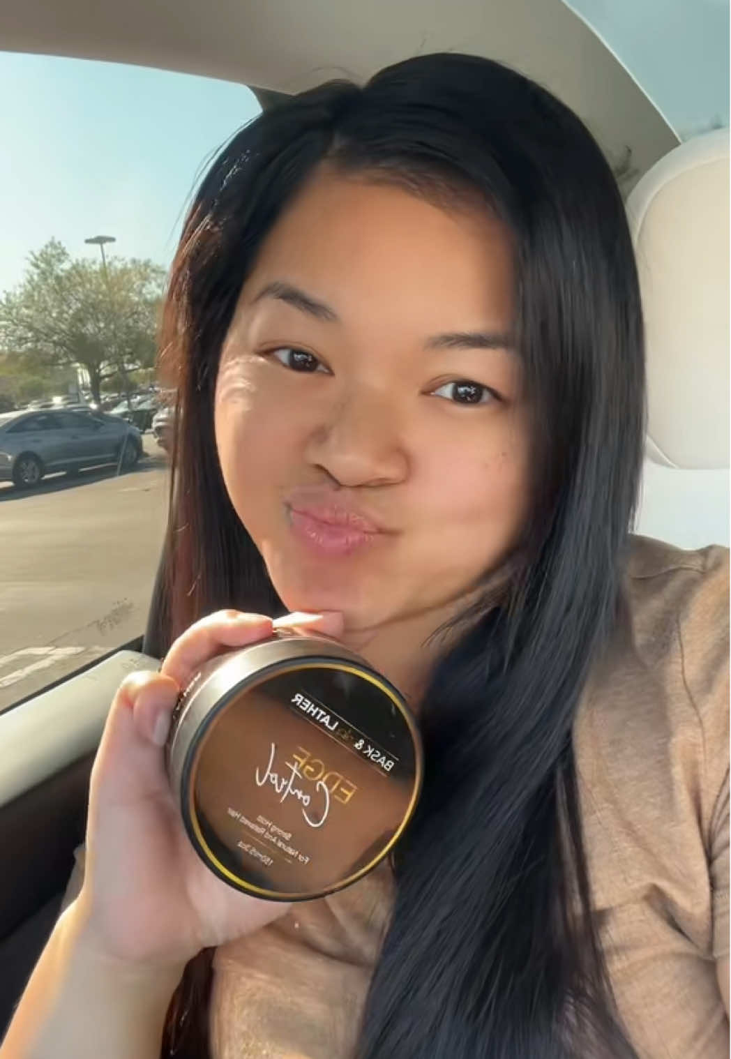 TikTok post by @icookutry for Bask and Lather Co. Caption reads: Bask and Lather edge control gel @Bask and Lather....