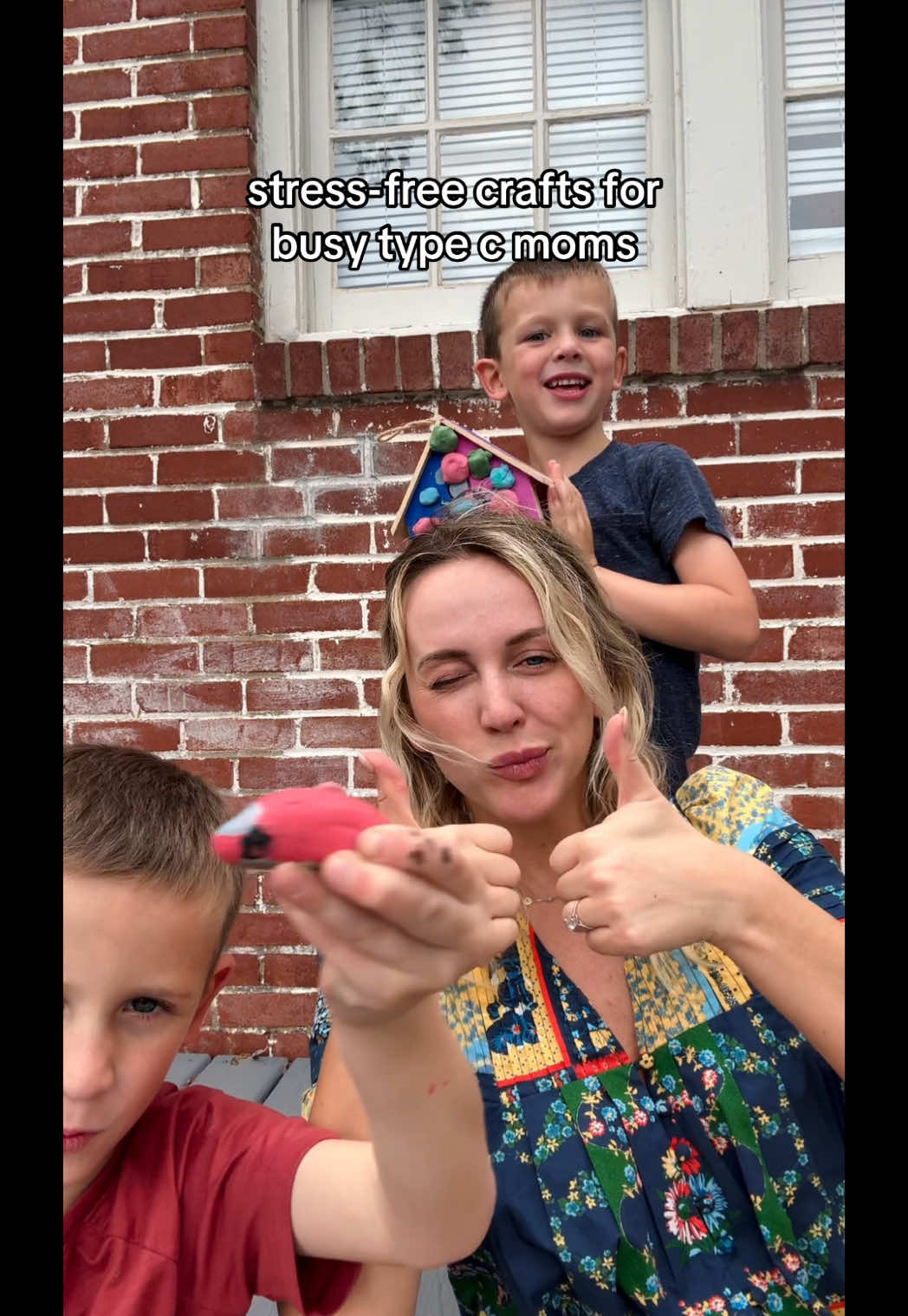 TikTok post by @thecorporatemama for Sharpie. Caption reads: #AD we love a spring craft where cleanup doesn’t....