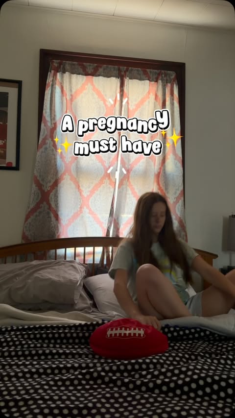 Instagram post by @brooklynbascue for Momcozy. Caption reads: Momcozy U Shaped Pregnancy Pillow is the BEST....