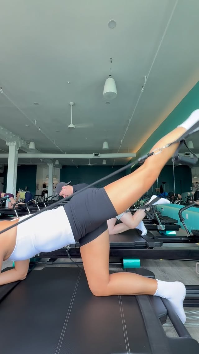 Instagram post by @gretchengeraghty for ATHLETA. Caption reads: [...] our puppy & a little pilates & coffee!....