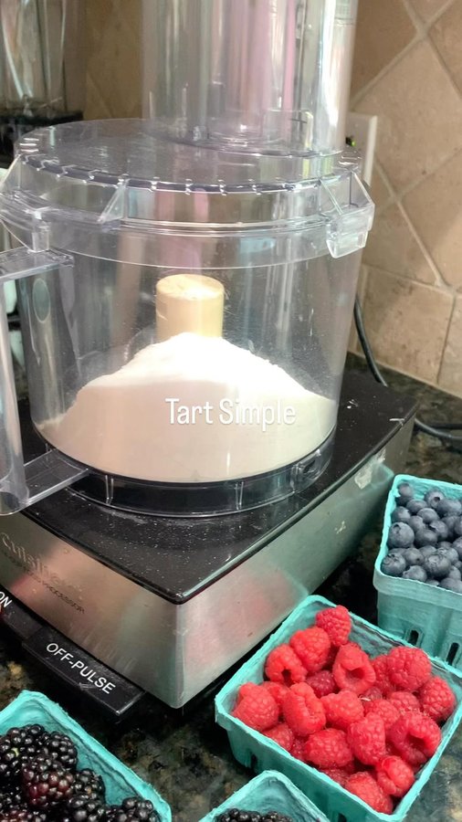 Instagram post by @aperfectfeast for Tea Runners. Caption reads: These peach tarts are almost too pretty to eat 🍑✨....