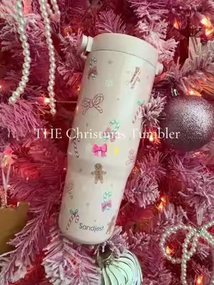 TikTok post by @cavalierdiaries for Sandjest. Caption reads: [...] #BowChristmas #ChristmasFinds @SANDJEST.