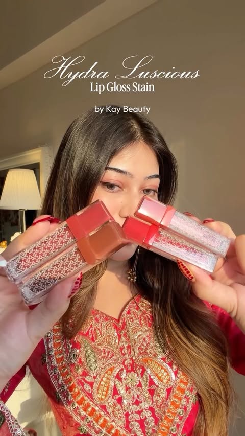 Instagram post by @nandini_malviya for Kay Beauty. Caption reads: [...] Lip Gloss Stains are doing both❤️ #KayBeauty....