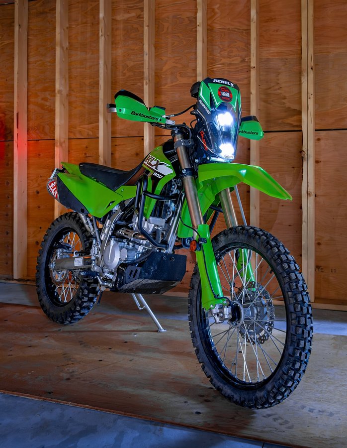 Instagram post by @killianmoreno for Outback Motortek. Caption reads: Why is this bike so underrated? Our Kawasaki 💚....