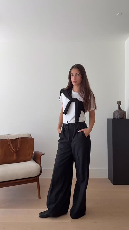 Instagram post by @tamaramory for Everlane. Caption reads: [...] 🖤 The Fall Edit 002 @everlane....