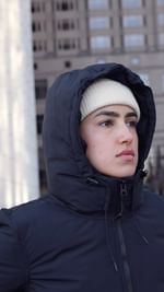 Instagram post by @tatimendoza__ for Alpha Industries. Caption reads: [...] and cozy in my Short Parka from....