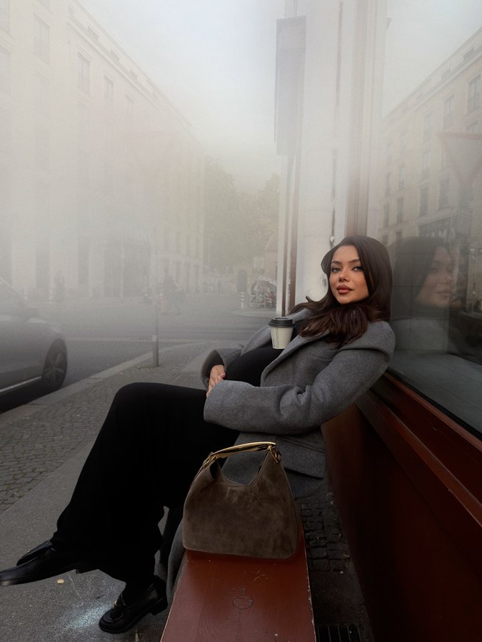 Instagram post by @michaelaberdaga for Elleme. Caption reads: [...] @camilacoelhocollection @revolve coat....