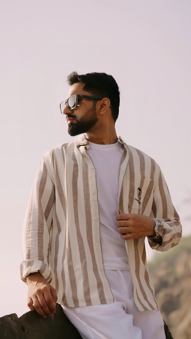 Instagram post by @kshitij.anandd for TATA CLiQ Luxury. Caption reads: [...] defined by timeless luxury with....