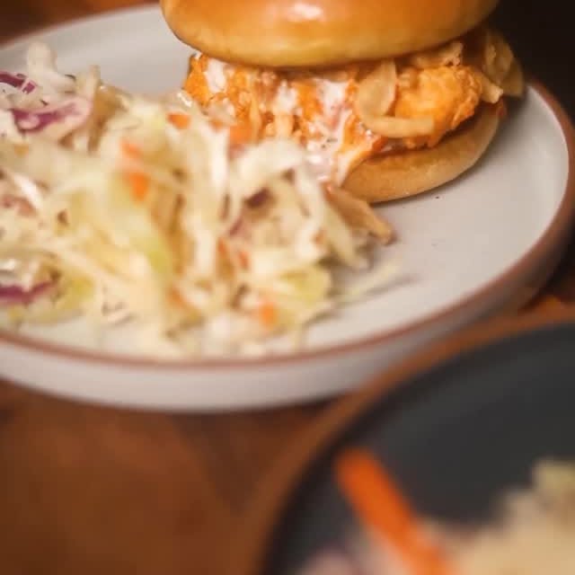 Instagram post by @codytriesstuff for Blue Apron. Caption reads: A pulled buffalo chicken sandwich so easy you can....