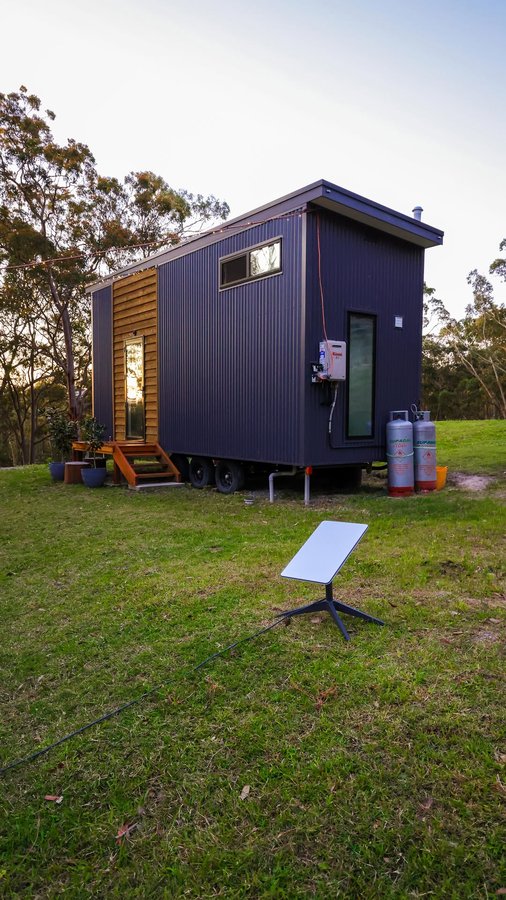 Instagram post by @livingbiginatinyhouse for SpaceX. Caption reads: Starlink has been an amazing help to us on our....