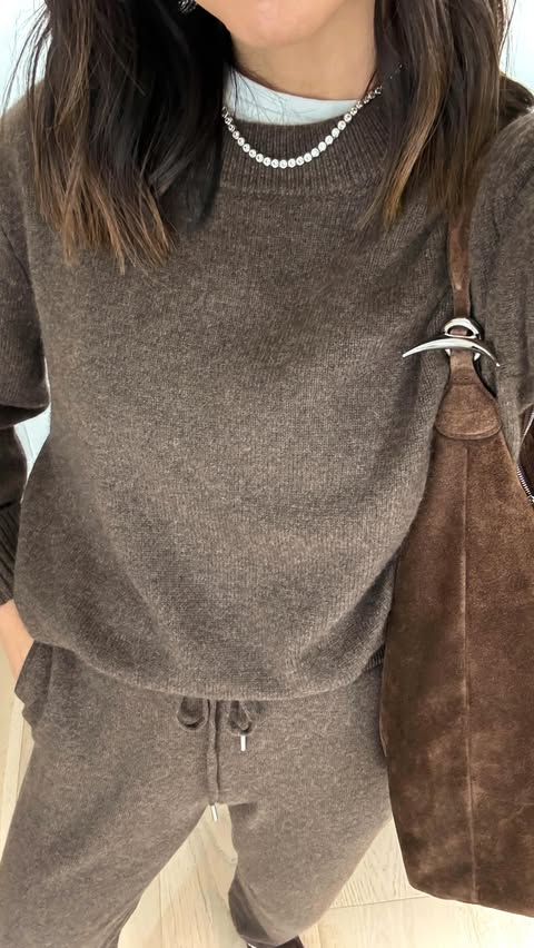 Instagram post by @crystalinmarie for Quince. Caption reads: [...] sweater staples to pick up from @onequince.....