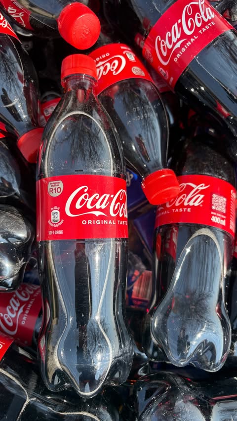 Instagram post by @dali.danger for Coca-Cola South Africa. Caption reads: Sometimes a 10/10 day is simply good food, good....