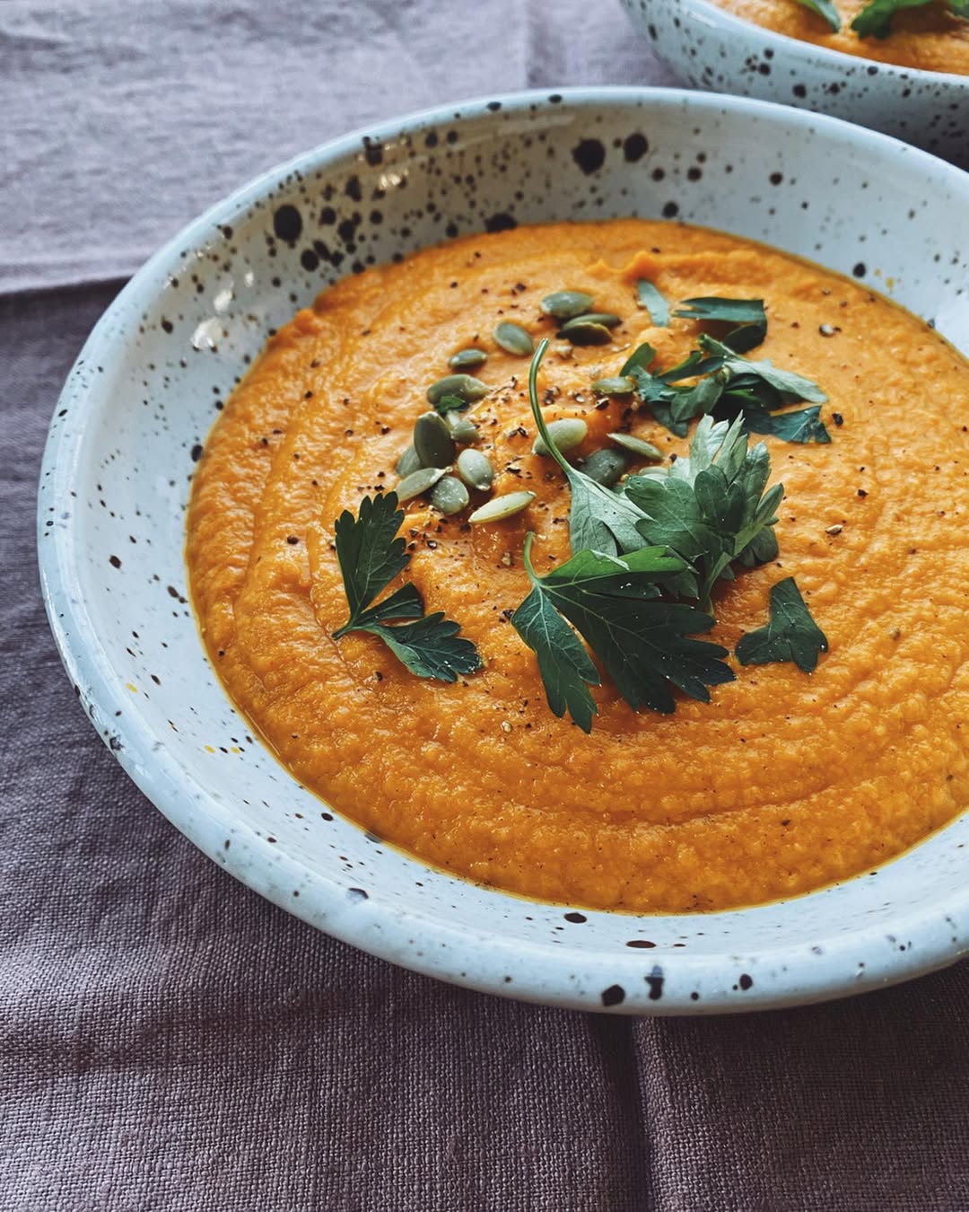 Instagram post by @samanthainperson for THRIVE Magazine. Caption reads: #ad carrot curry soup! an easy winter staple....