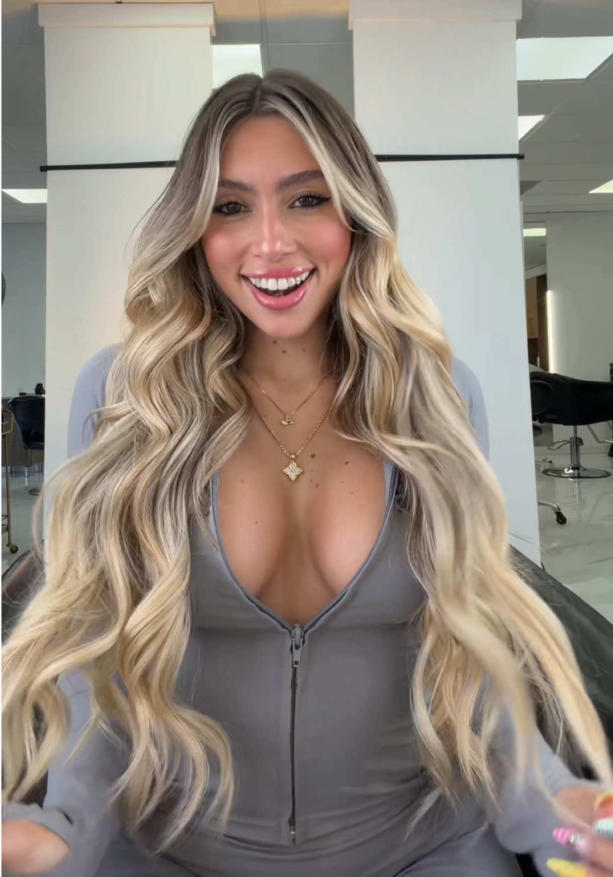 TikTok post by @andreacarmonaa for BELLAMI Hair. Caption reads: [...] entered my weft era 🤭✨I finally got....