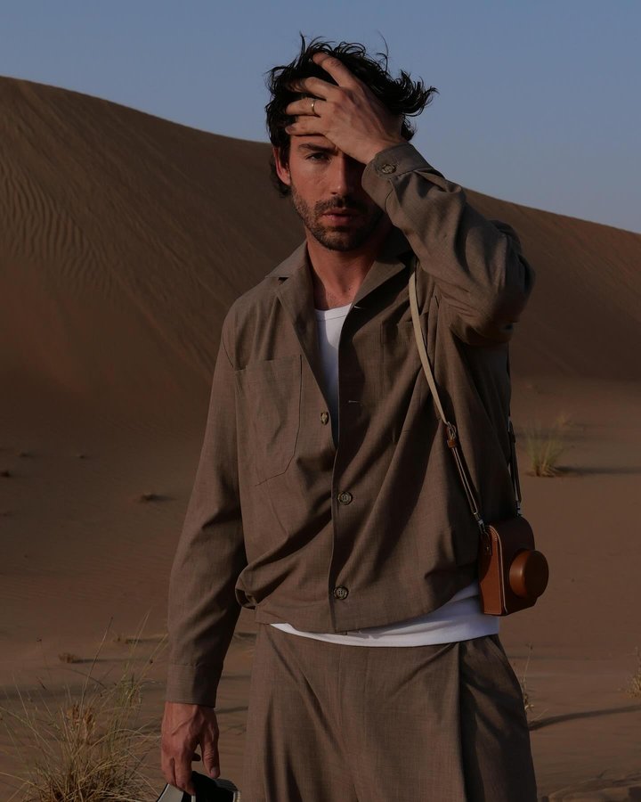 Instagram post by @ignaziomoser for Imperial Fashion. Caption reads: Timeless desert beauty meets modern architecture....