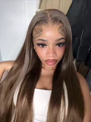 TikTok post by @favour.mb for Sterly Hair. Caption reads: @sterlyhair 💕 chocolate brown wig | link in my....