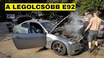 YouTube post by @OliverAmon93 for carVertical. Caption reads: Megvettem a legolcsóbb BMW-t 😭.