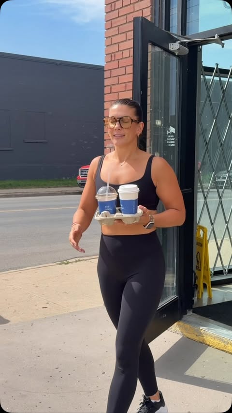 Instagram post by @courtlynf for Nike Women. Caption reads: Post Pilates coffee in my @nikewomen @skims....