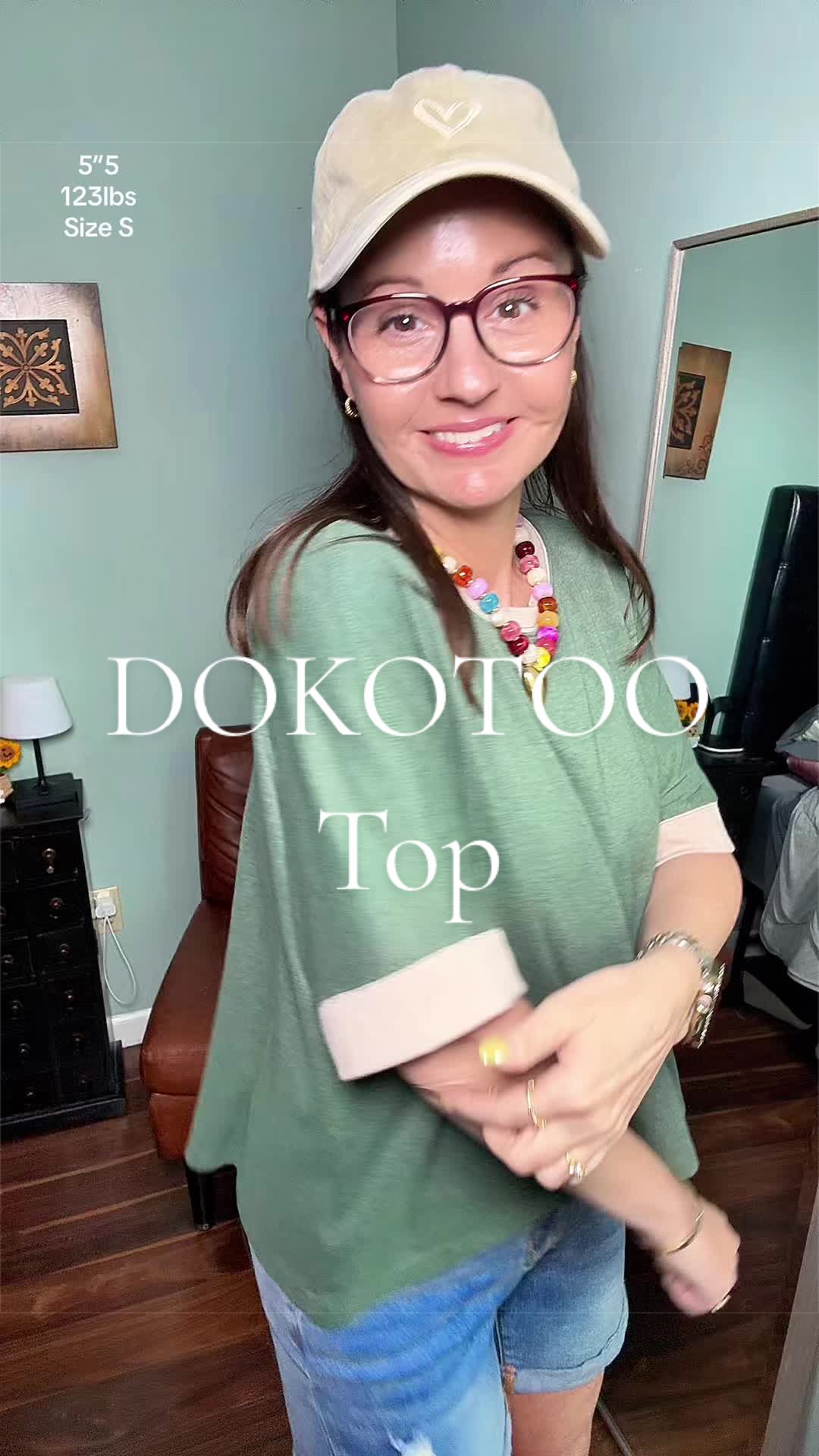 TikTok post by @tishstewart1 for Dokotoo. Caption reads: #Tshirt #flowyshirt #comfyfit #dokotoo....