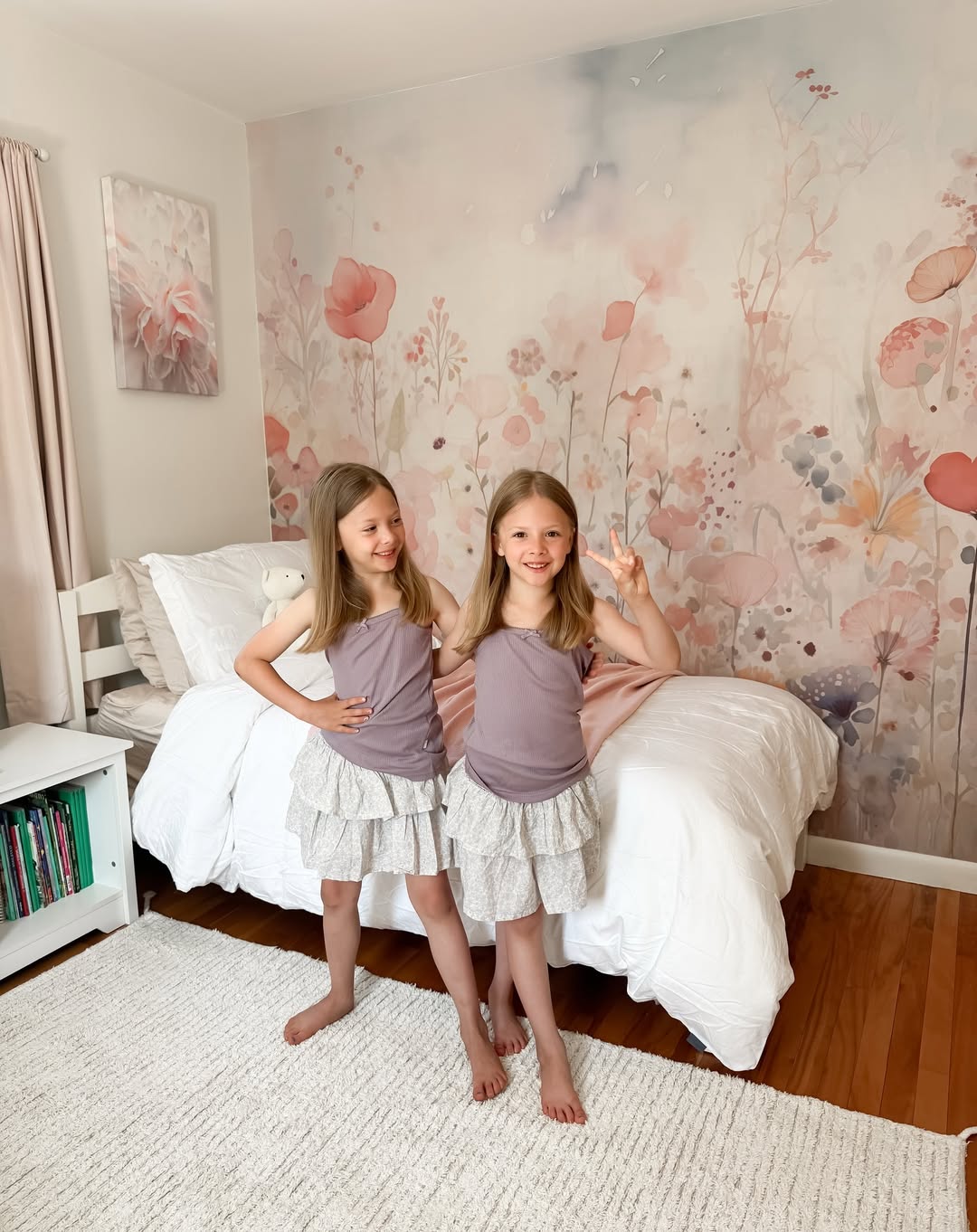 Instagram post by @christinaemiller for Photowall. Caption reads: #ad We added a gorgeous mural to the girl’s room....