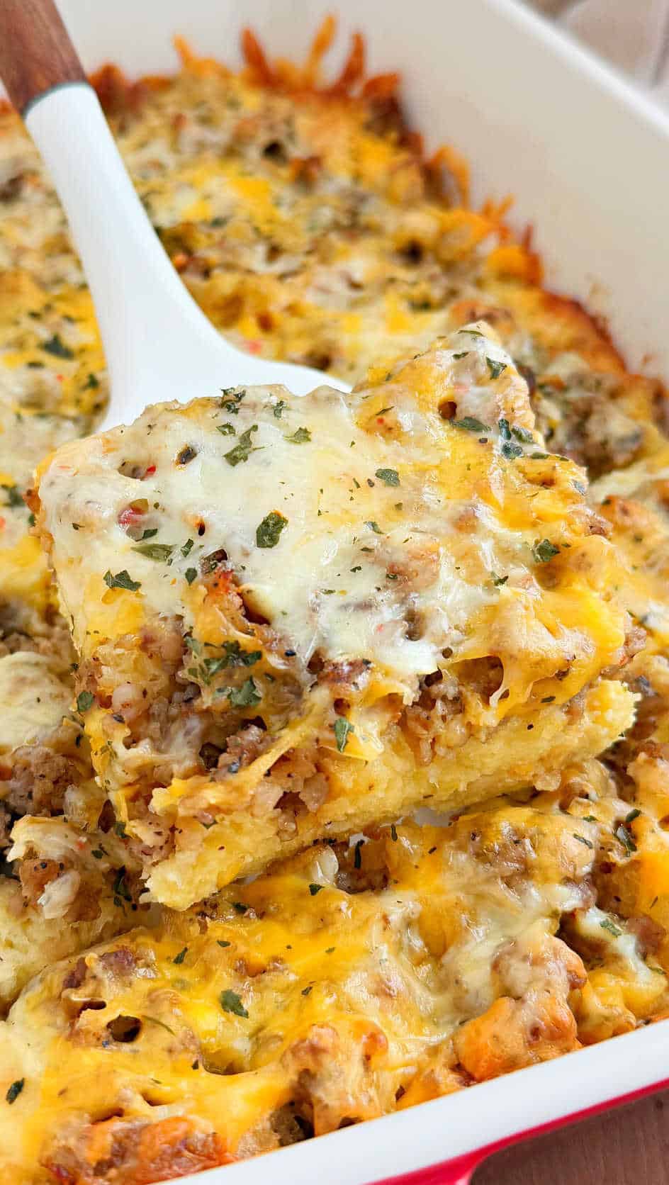 Instagram post by @meatloafandmelodrama for Caraway Home. Caption reads: Sausage and Egg Breakfast Casserole with....