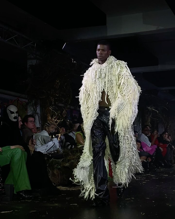 Instagram post by @maximilianraynor for Spectrum Collections. Caption reads: ‘The Fish Forager’ zero waste neo-fur made from....