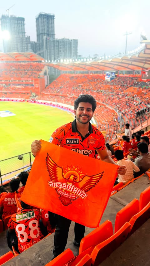 Instagram post by @kasyapmusic for Ajio. Caption reads: [...] 🧡🏏 From shopping the SRH jersey on AJIO to....